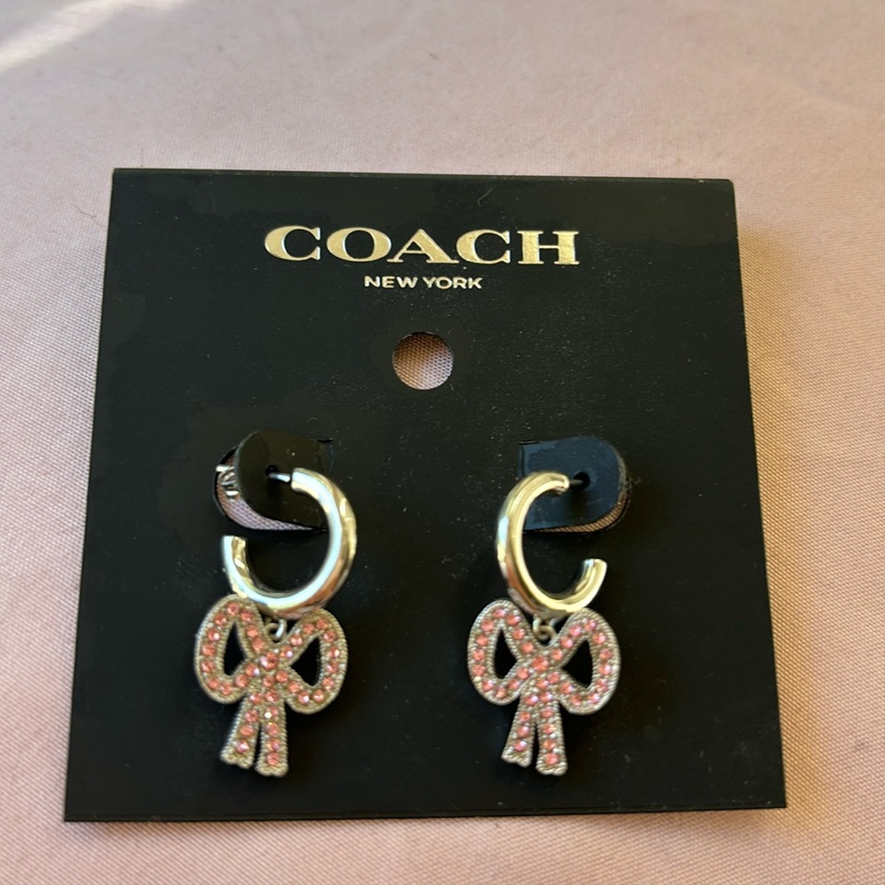 Dangling bow earrings, silver, pink stones, brand new